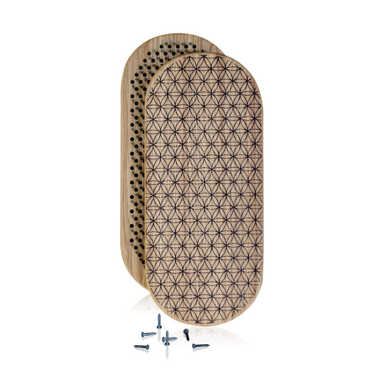 wooden board with nails with flower of life engraving