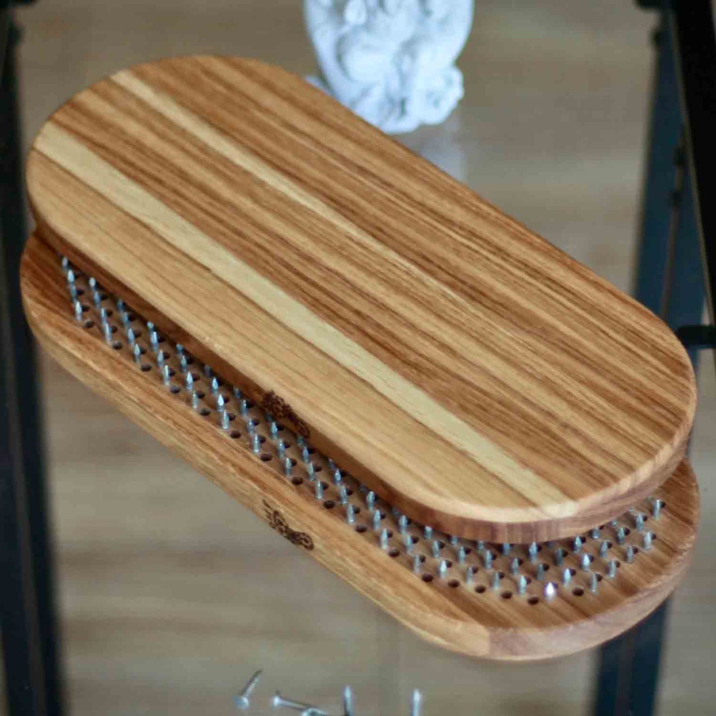 Sadhu board on the glass table with Ganesh