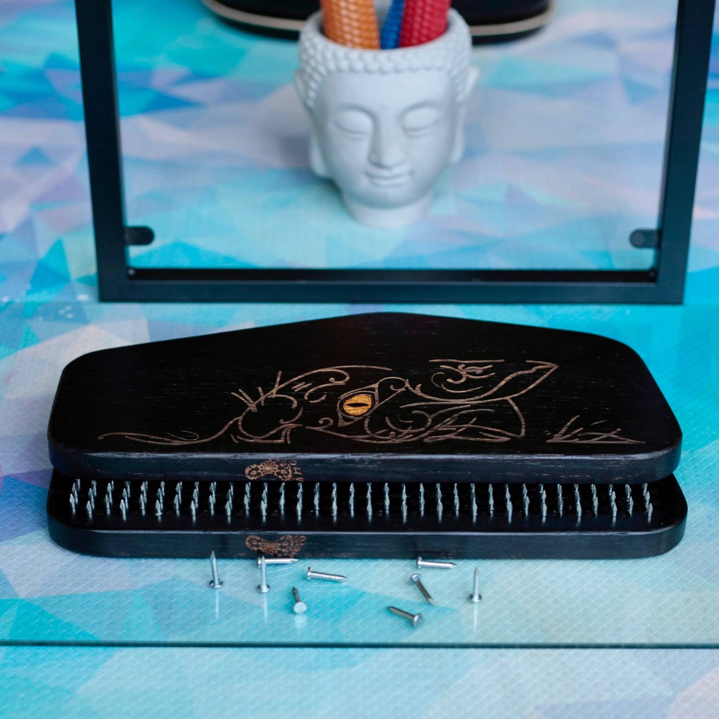 Folded sadhu board with nails, candle holder like buddha