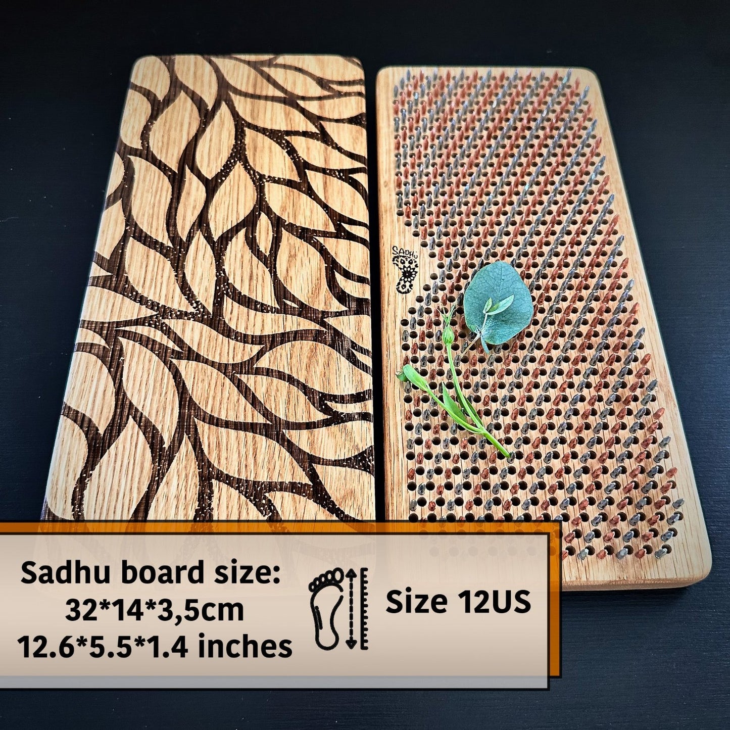 sadhu board with leaves engraving and copper and steel nails in rows with green leaves on sadhu board