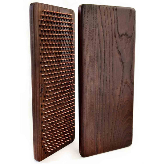 thermo ash wood sadhu board with copper nails on white background