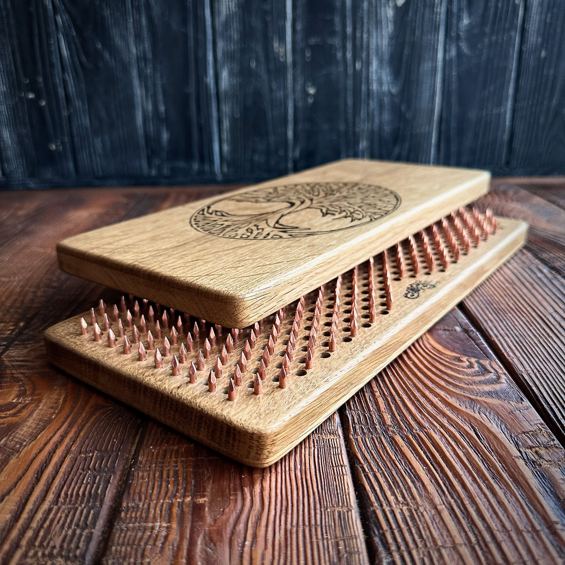 sadhu board with copper nails half opened on wooden background