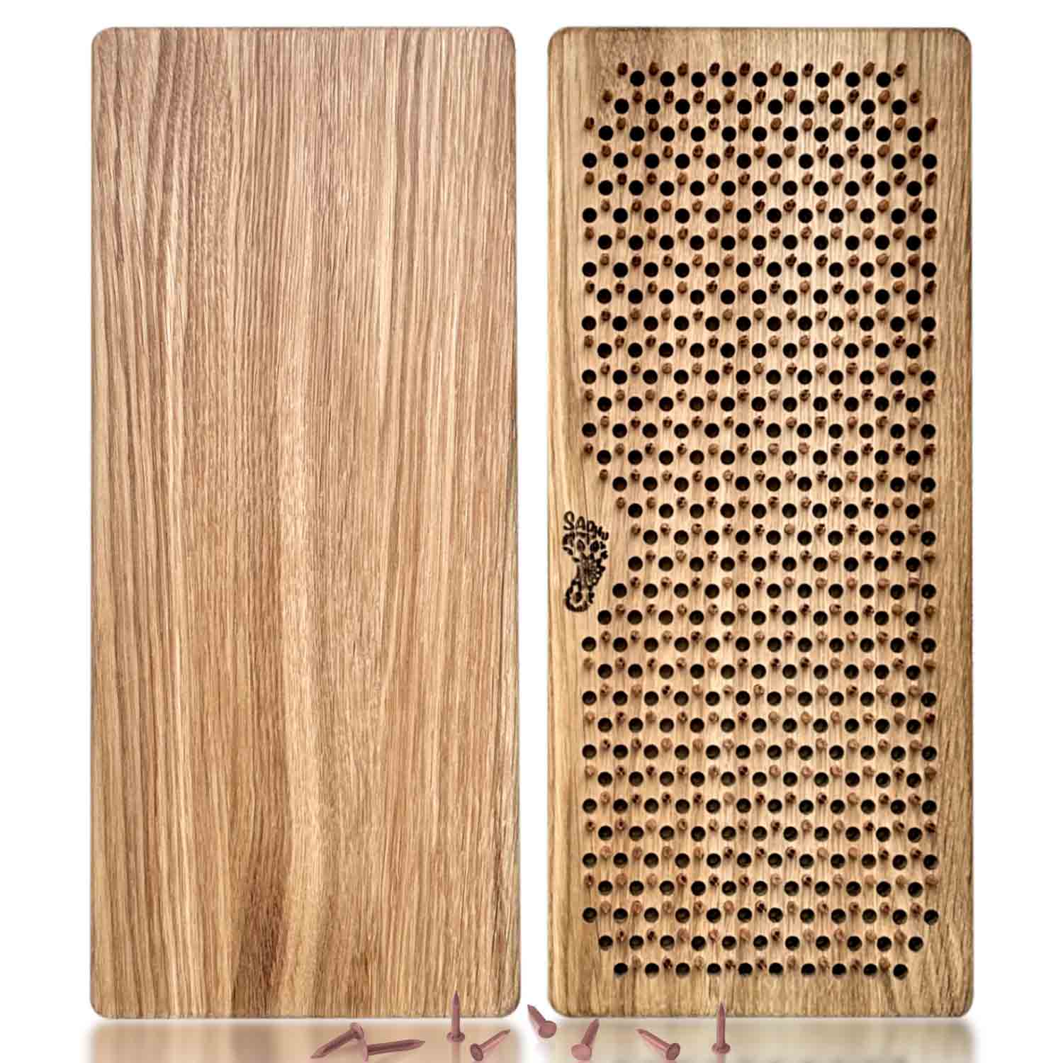 sadhu board with copper nails and natural oak with reflection on white background, some loose copper nails near sadhu boards