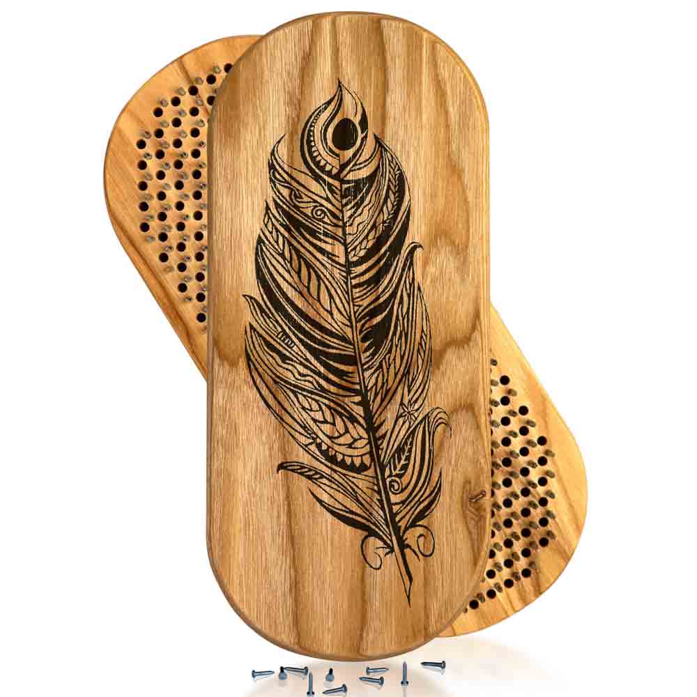 Sadhu board from natural wood and galvanized nails with feather engraving on a white background