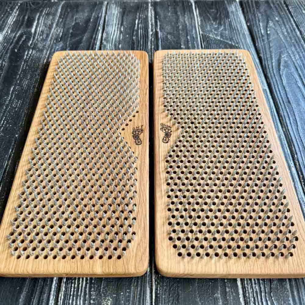 Two sadhu boards with nails for feet for beginners.