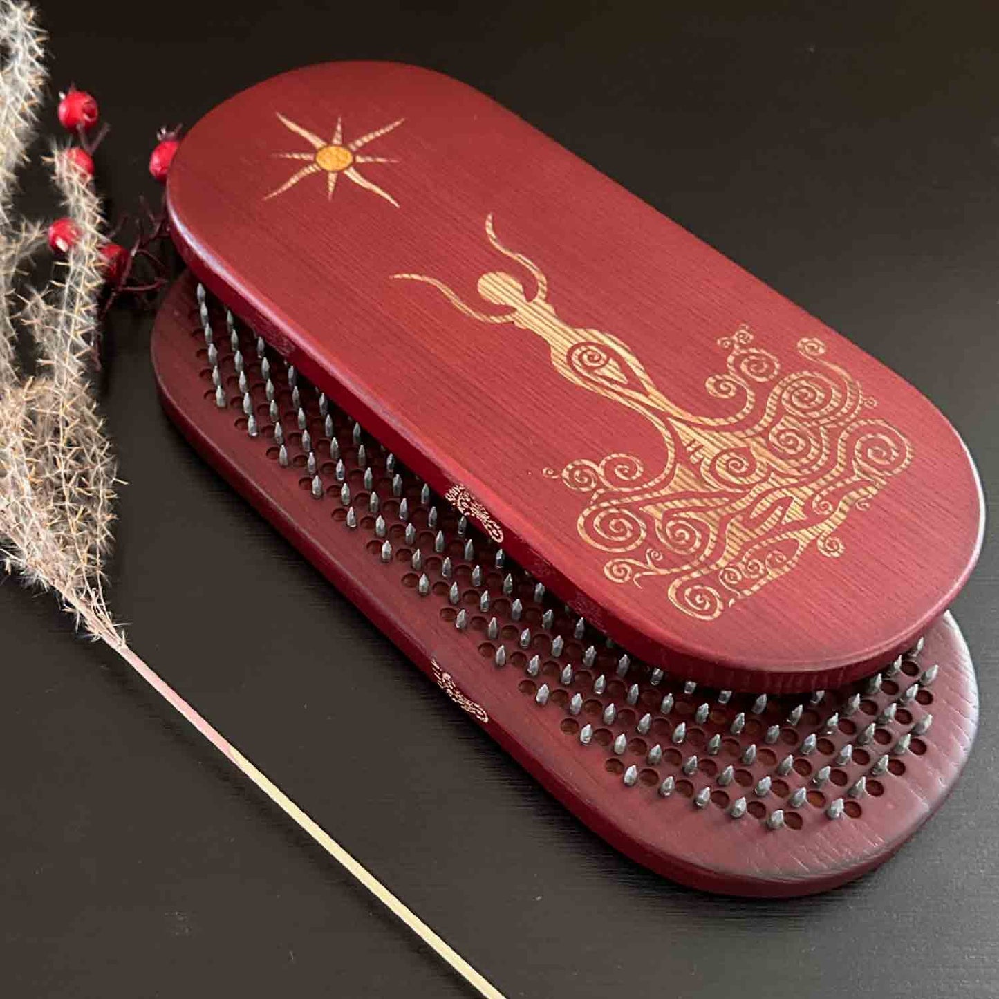 Wooden sadhu board with nails with spiral goddess engraving