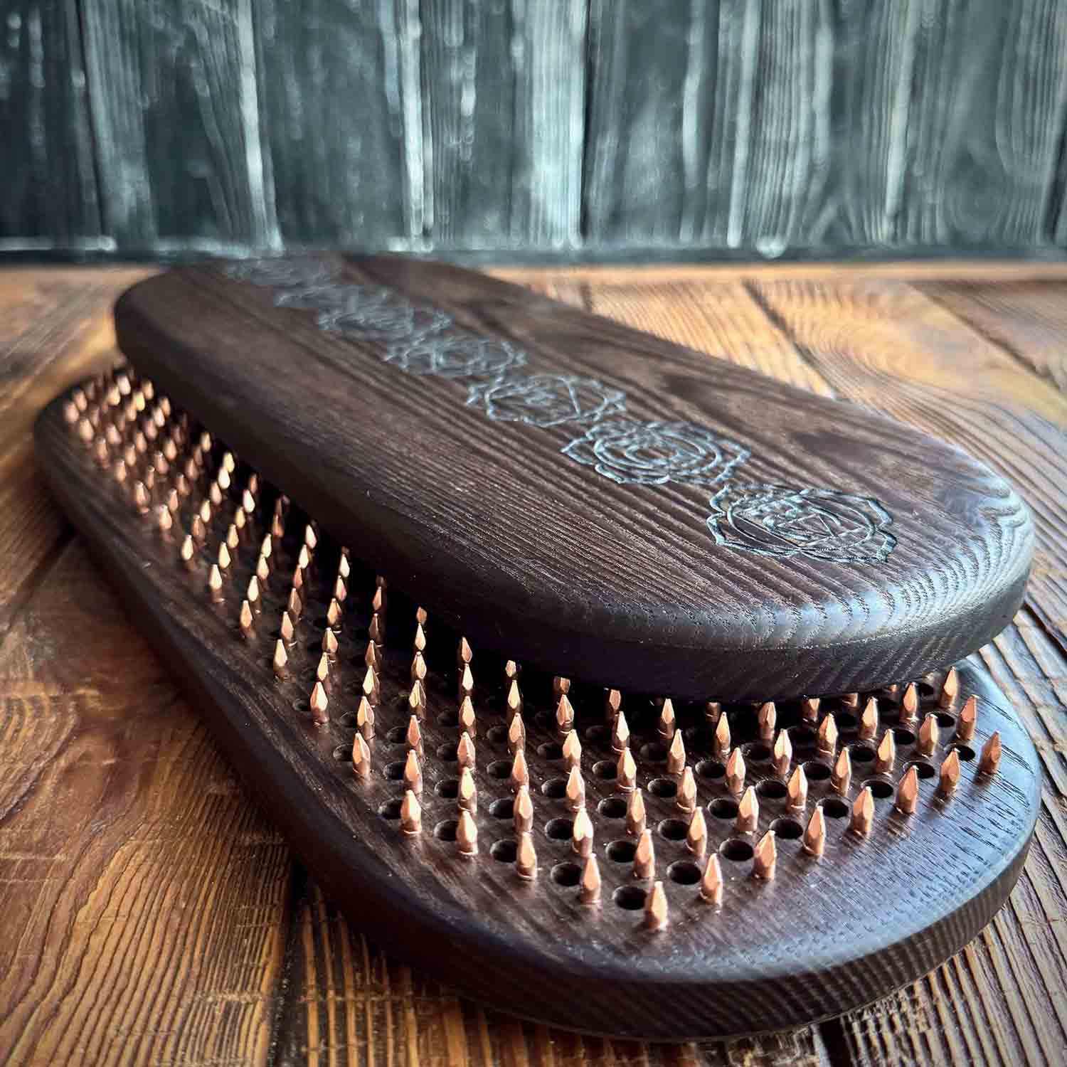 sadhu board in natural brown color of thermal ash with copper nails