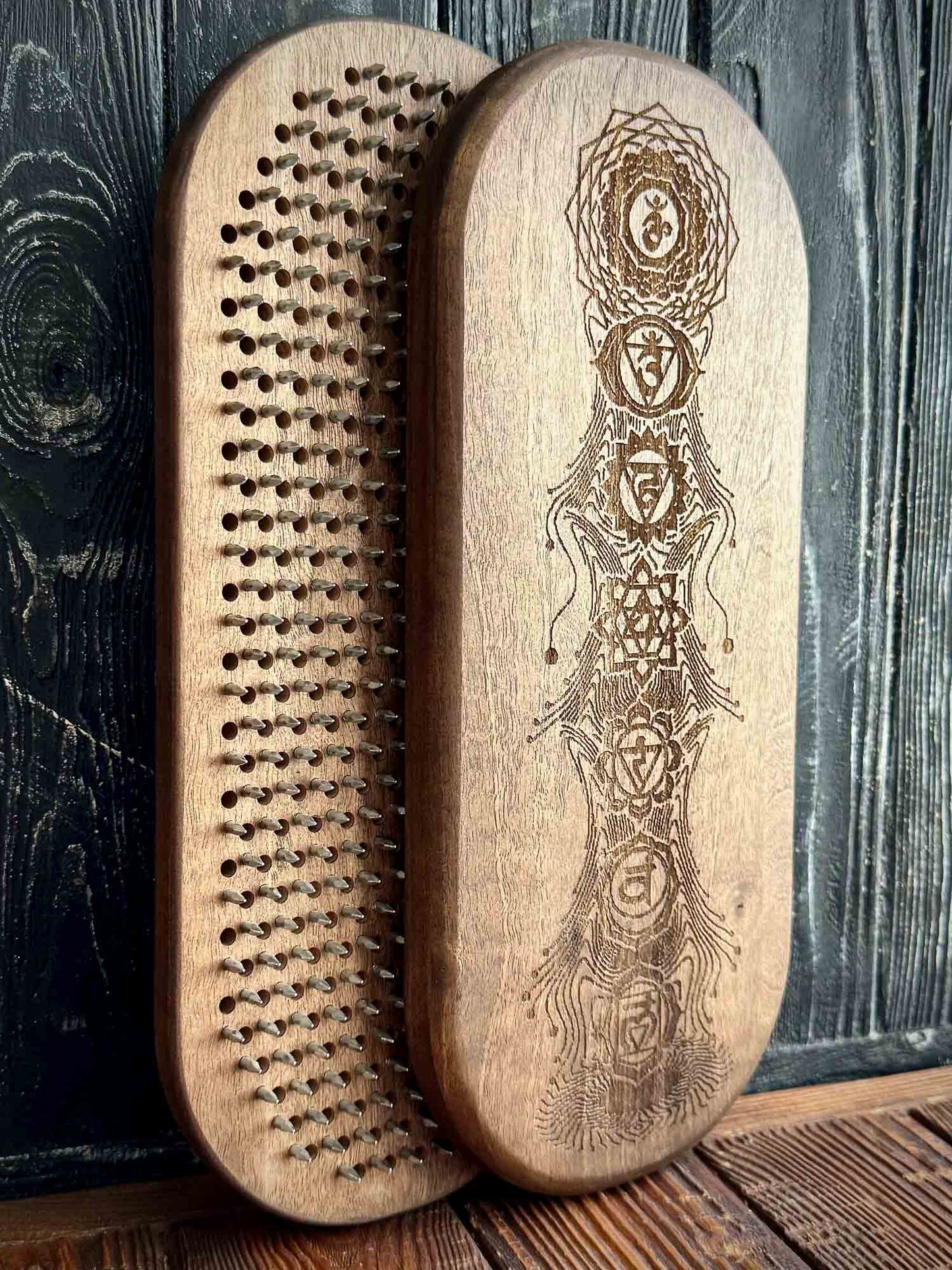 nail board for feet made from walnut and galvanized nails for yoga practice and meditation