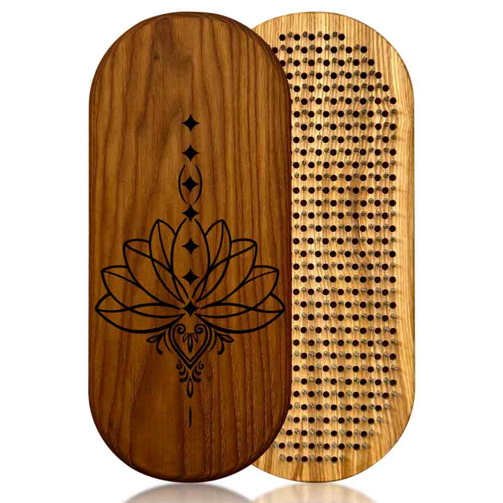sadhu board from ash and thermo ash with lotus engraving on a white background.
