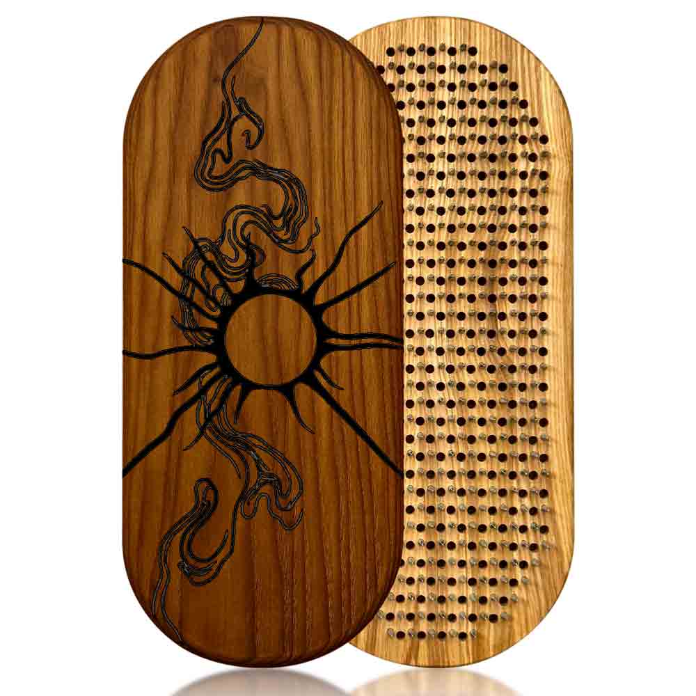 sadhu board from ash and thermo ash with sun engraving on a white background.