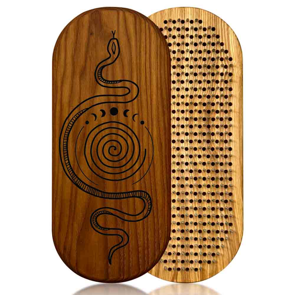nail board for feet  with snake design on one side and nails side on the other, on a white background.