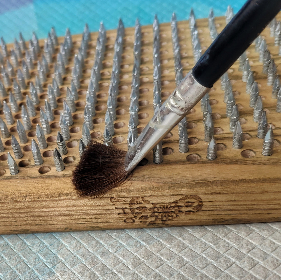 Brush on nails sadhu board