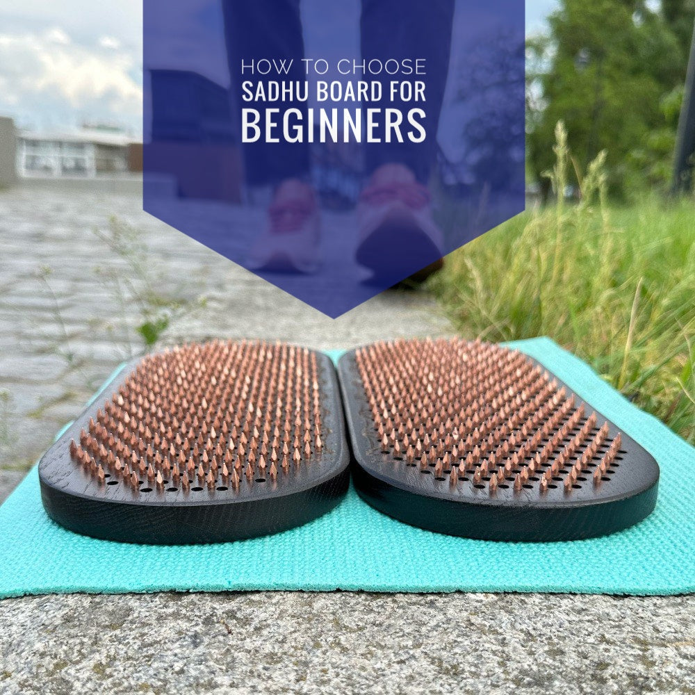 Article for beginners how to choose sadhu board. Man walking towards black sadhu board with copper nails