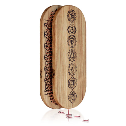folded wooden sadhu board with copper nails and engraving chakras and flower of life