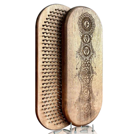 sadhu board for beginners made from natural walnut wood with galvanized nails for safe yoga practice. Engraved with 7 charas