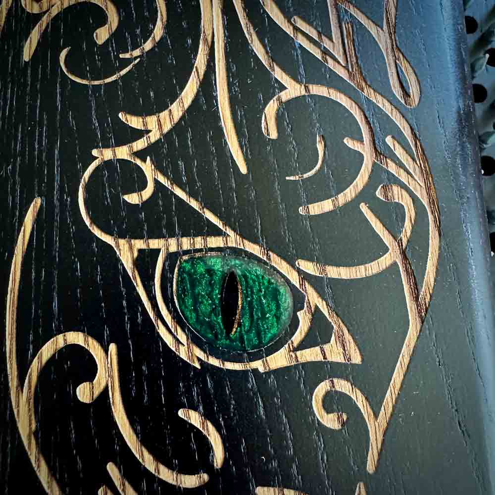 Black Sadhu nail board with Cat design and a green eye made from epoxy