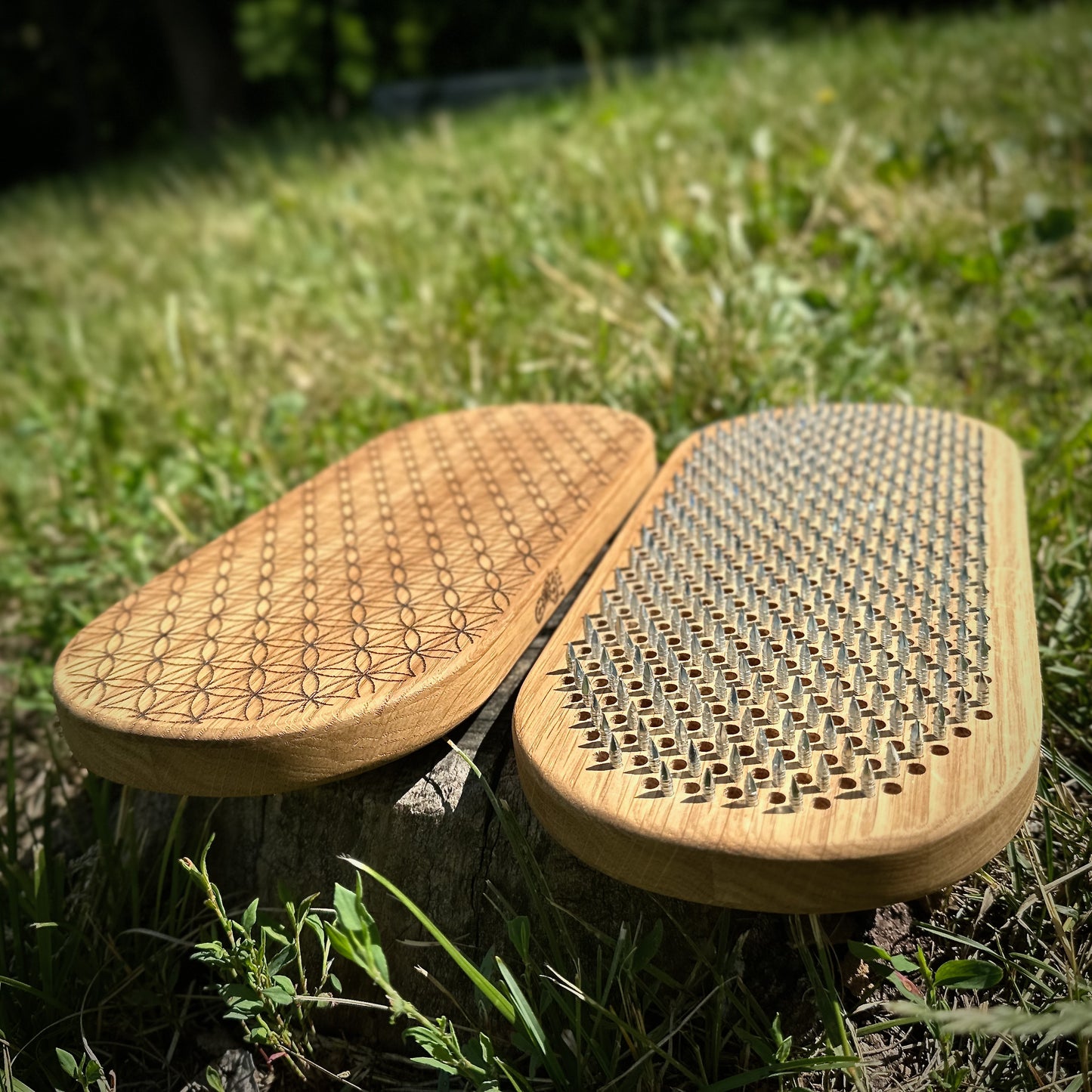 wooden sadhu board nails on grass