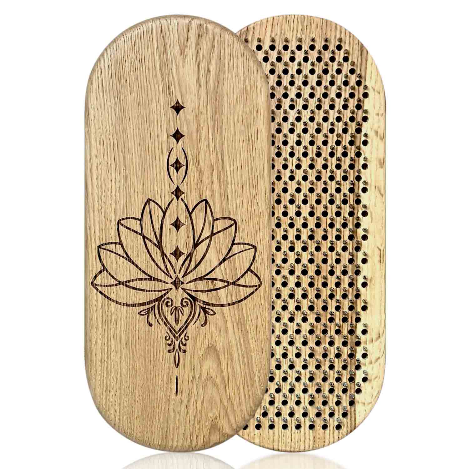 Oak wood sadhu nails board with lotus flower design on one side and nails on the other, on a white background.