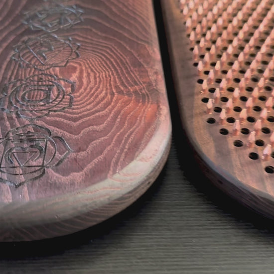 sadhu board with copper nails for yoga. Made from thermo ash in natural deep brown color. sadhu board 10 mm step between nails. Chakras engraving outside and flower of life engraving inside.