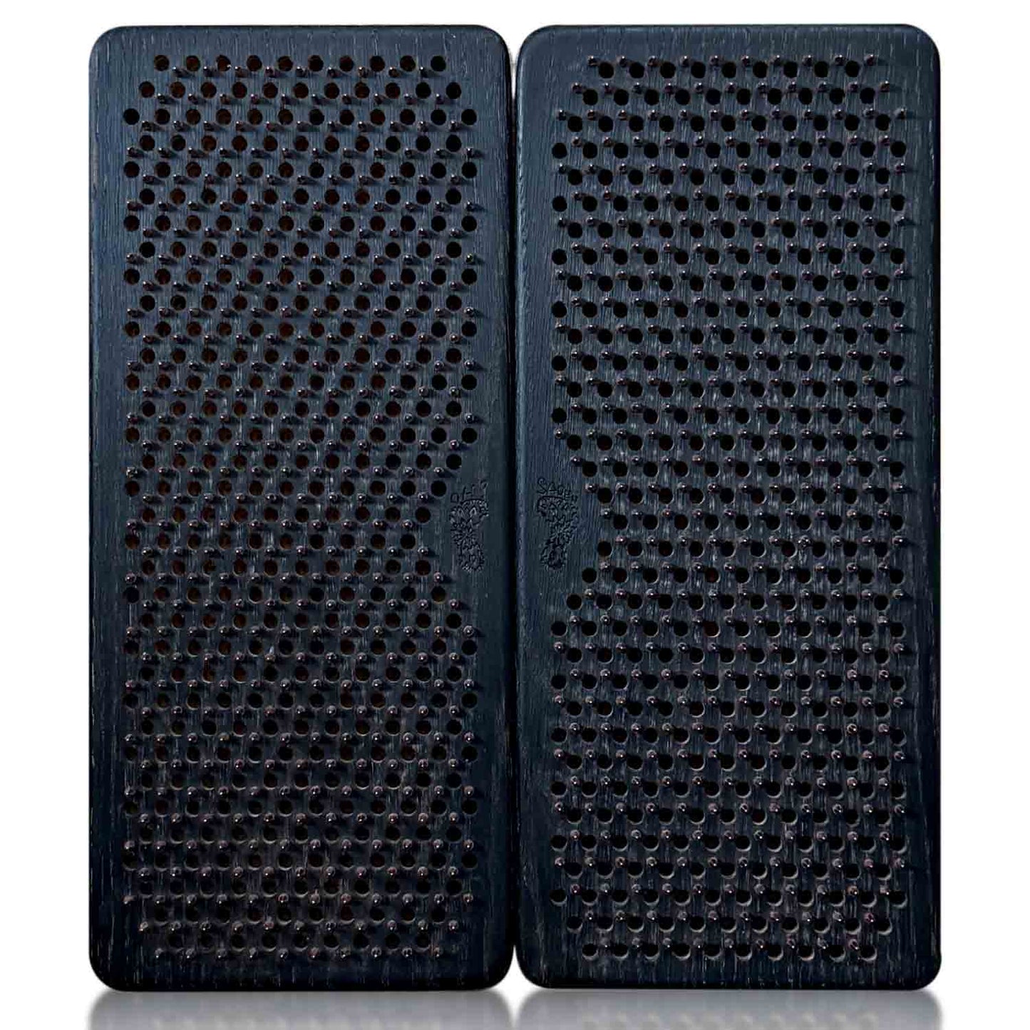 Two black Sadhu boards for beginners with copper nails, step 10mm, on a white background