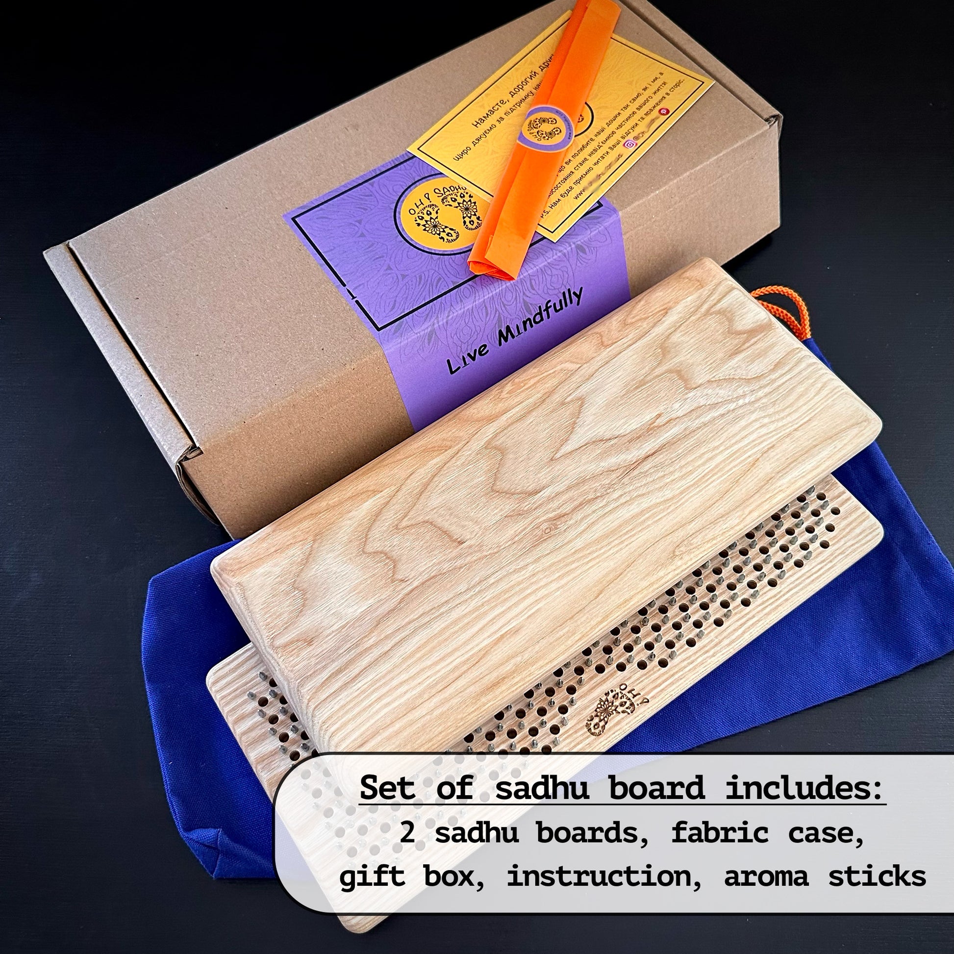 sadhu board set includes gift box, pouch, 2 sadhu boards, aroma stick, instruction on black background