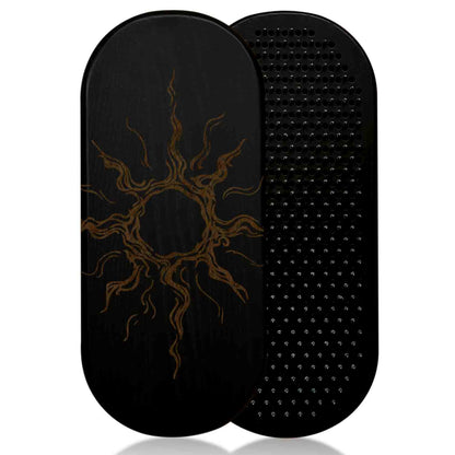 Black sadhu nail board with sun design on a white background