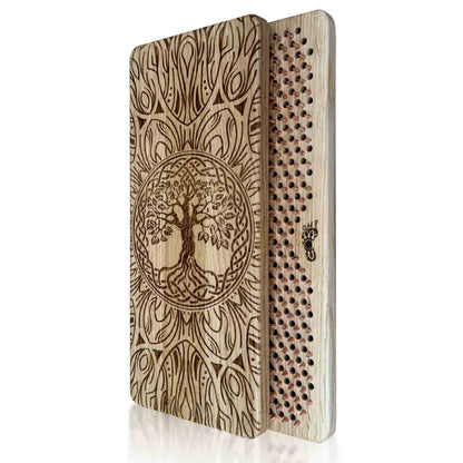 Oak wood sadhu board copper nails with tree of life design on a white background