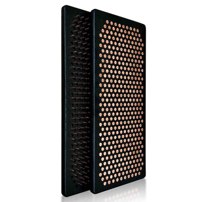 Black sadhu board with copper nails for feet on white background