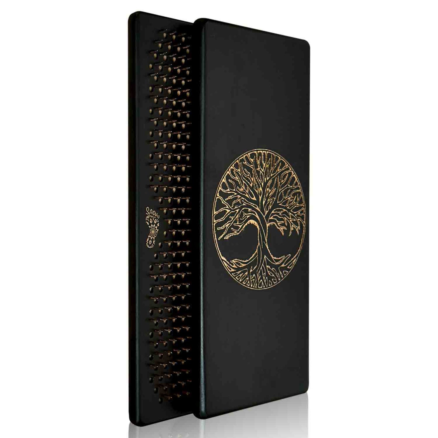 Black sadhu boards with copper nails with engraving tree of life design on a white background