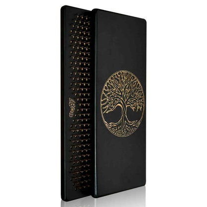 Black sadhu boards with copper nails with engraving tree of life design on a white background