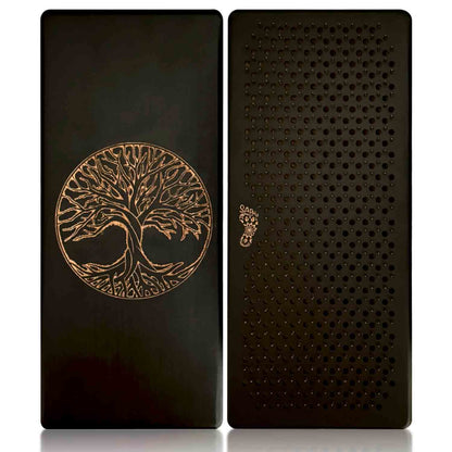 Black sadhu board with copper nails with tree of life design on one side and nails on the other, on a white background.