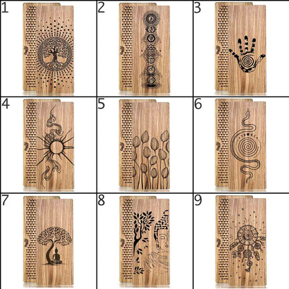 Oak wood Sadhu boards with various engraved designs like Tree of Life, Chakras, Buddha etc on a white background