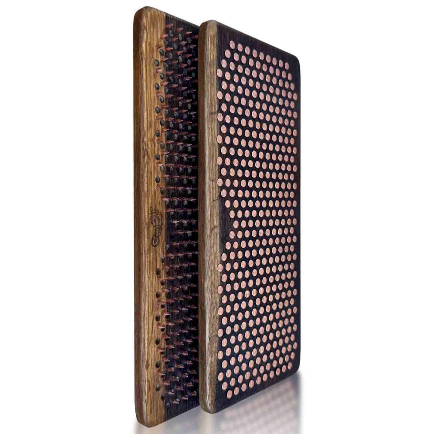 Fumed oak sadhu boards with copper nails in a black brown natural color shown on a white background.
