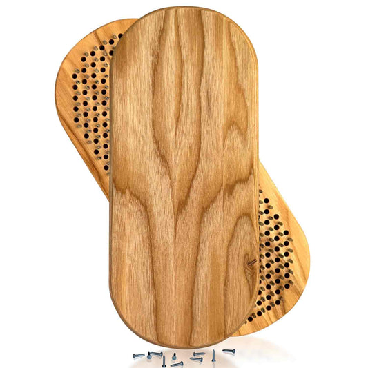 sadhu board with nails for feet from natural ash wood on white background