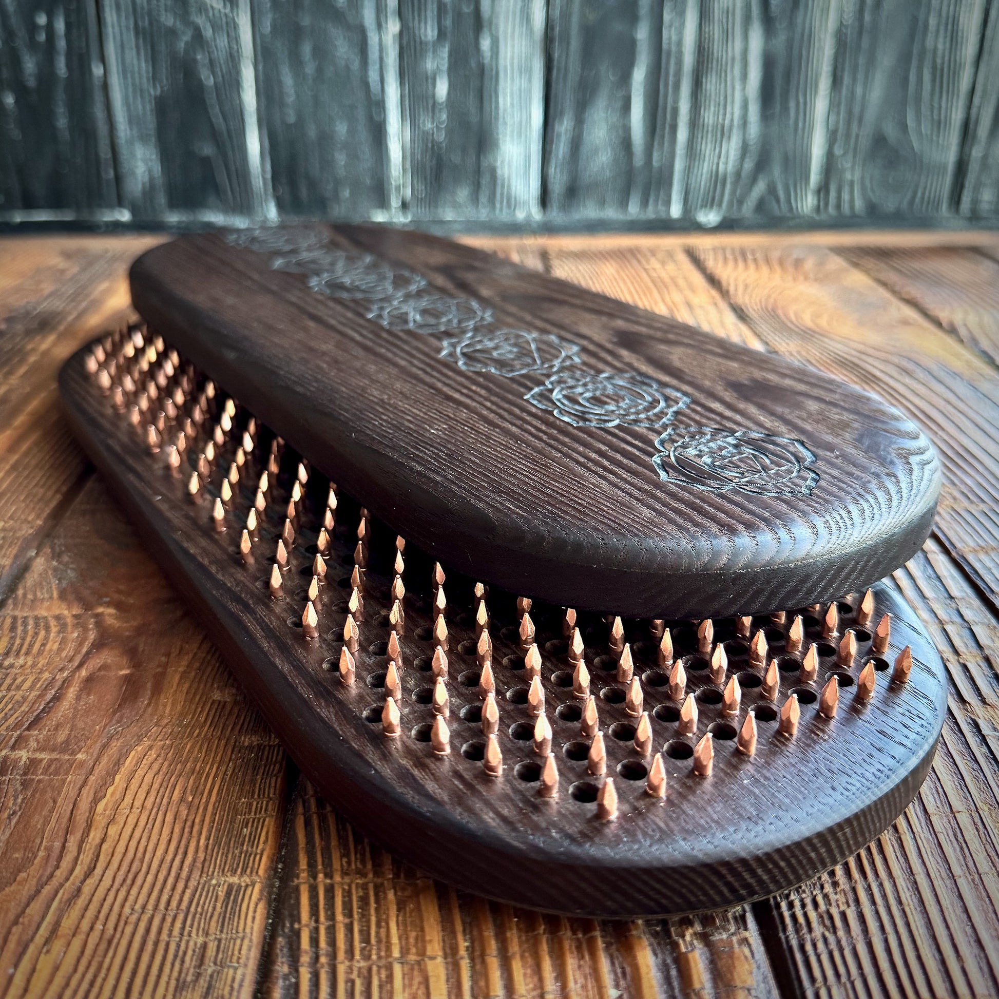 sadhu board in natural brown color of thermal ash with copper nails