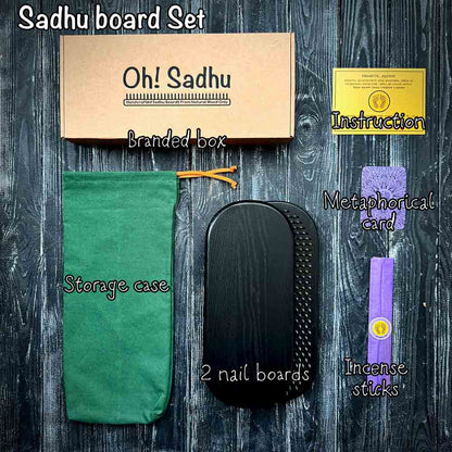 Sadhu board set with branded box, storage case, nail boards, and incense sticks on a wooden surface.