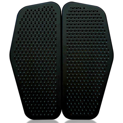 Pair of black Sadhu nail boards on a white background
