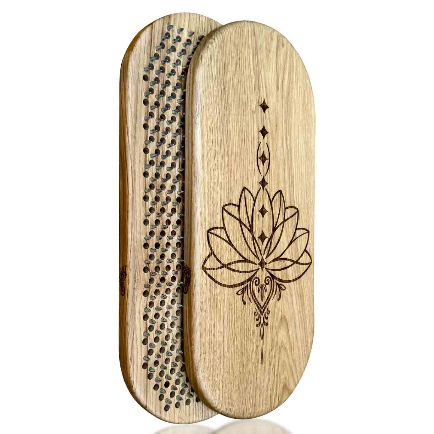 Oak wood sadhu board with engraved lotus design on a white background