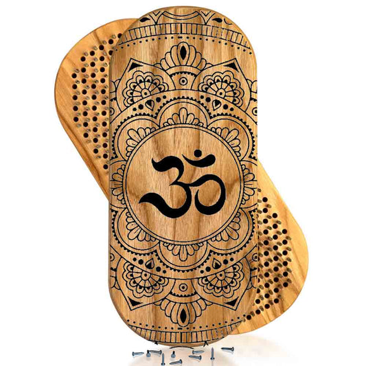 Wooden sadhu board with nails with mandala design and Om symbol on a white background