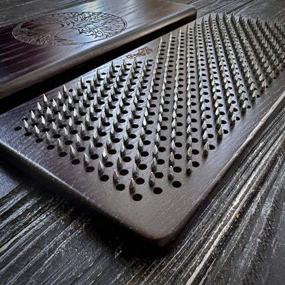 Close-up of nails on Sadhu Board for meditation